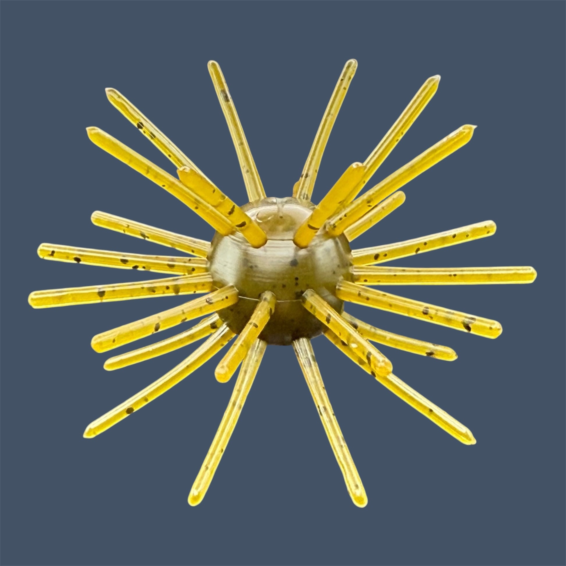 Oddball 2.5-inch urchin style bass fishing bait with 28 appendages. Shown in color Green Pumpkin