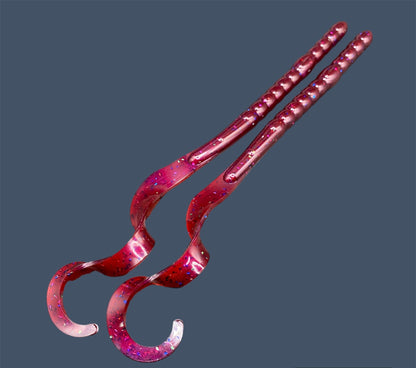 Large Curl Tail Worm 10" with a realistic curl tail, ideal for Texas and Carolina rigging, available in Plum Silly (Red)