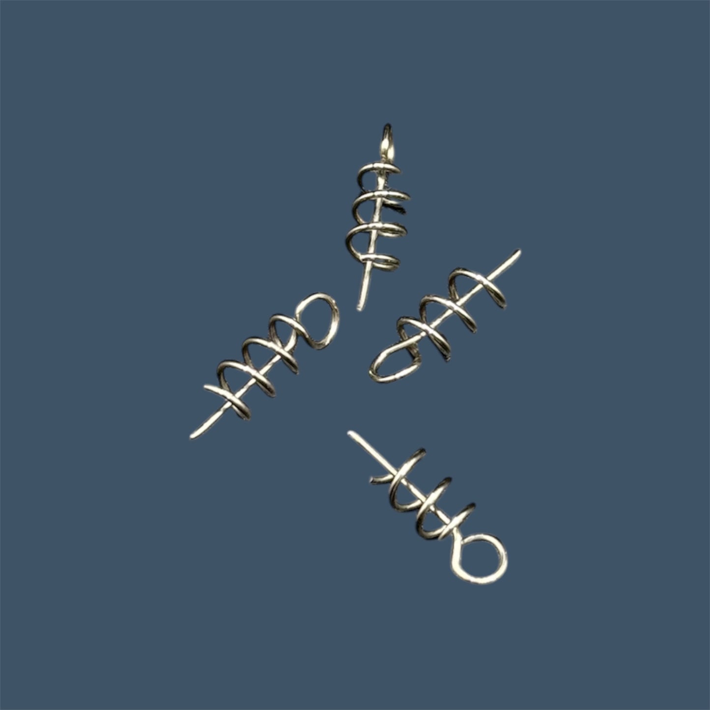 Centering pins used for easy rigging of the Skirted Cube / fuzzy dice style baits