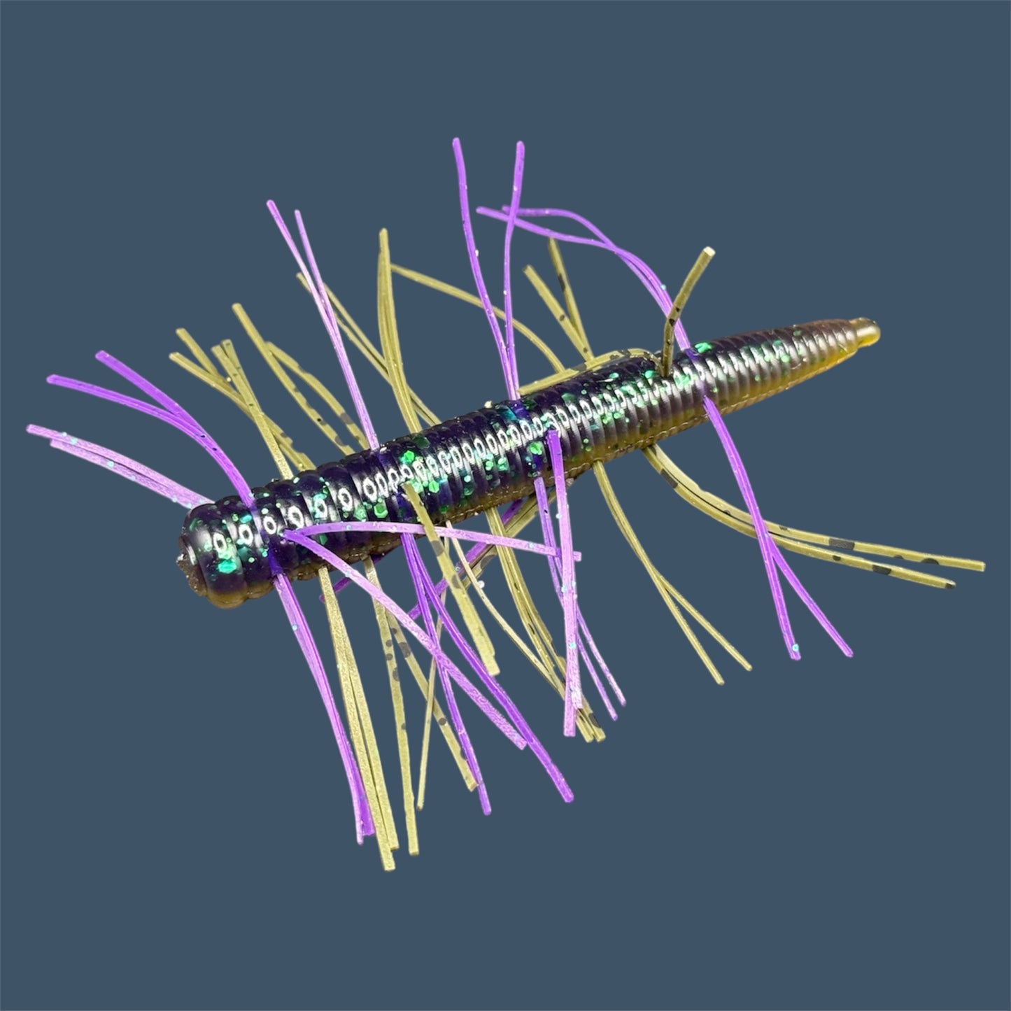 Fuzzy N3D (Ned Rig Style Bait) Soft Plastic Bait. Shown in Swamp Juice (Purple and Green Pumpkin). Fuzzy Soft Plastic Fishing Lures