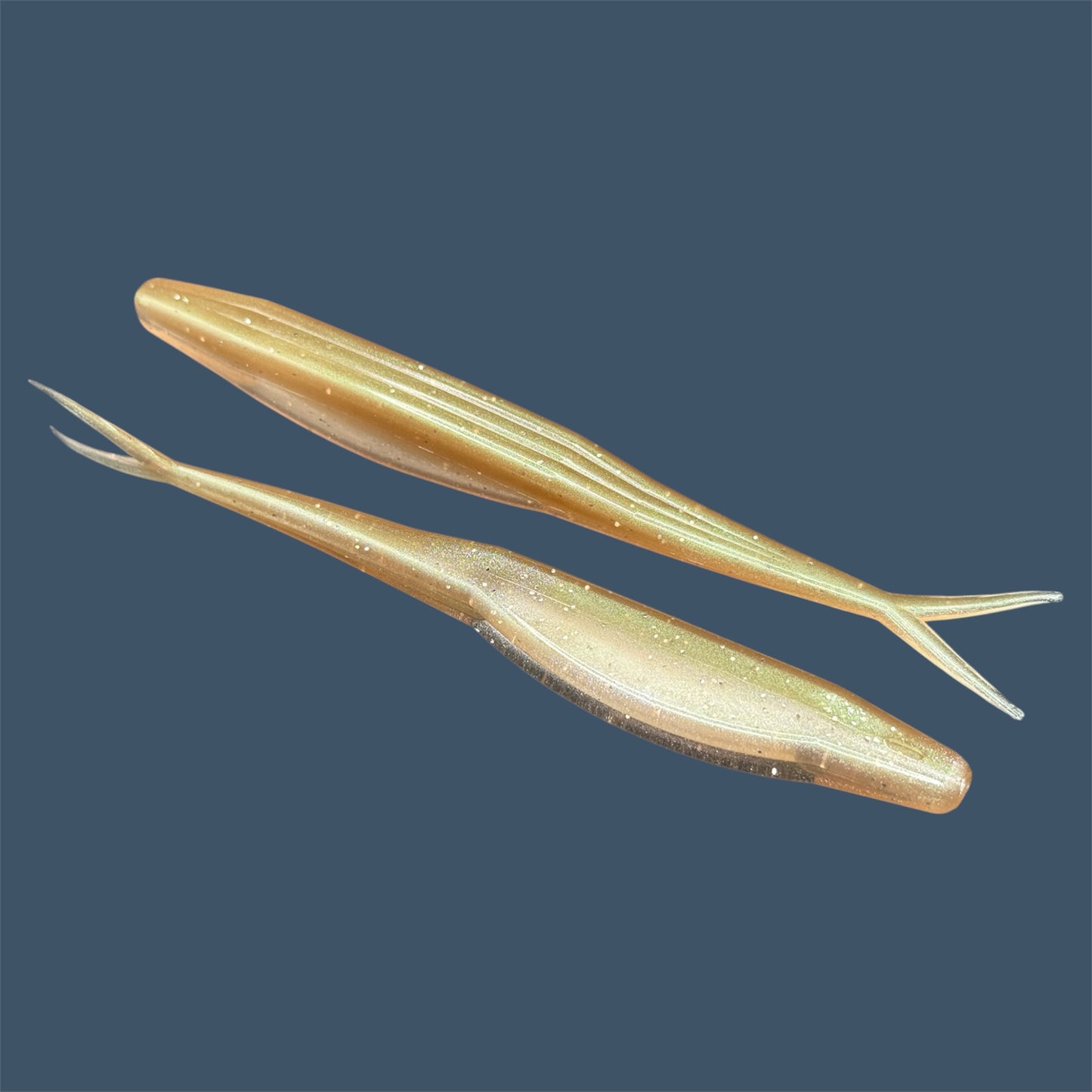 Split Tail Shad soft plastic Fluke style bait with realistic shad appearance, featuring a slotted belly for weedless rigging. Jerkbait in Tennessee Shad a proven fish-catching color