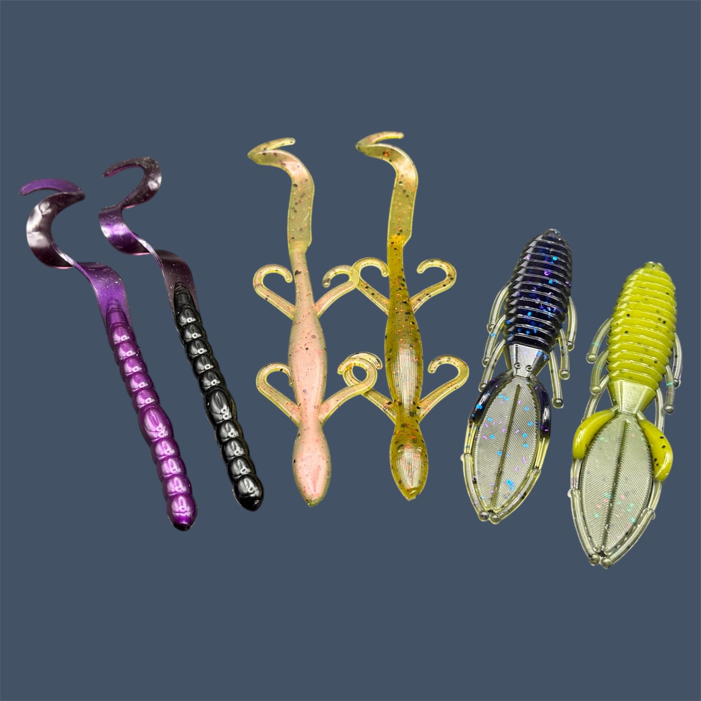 Set of colorful fishing lures on a dark background