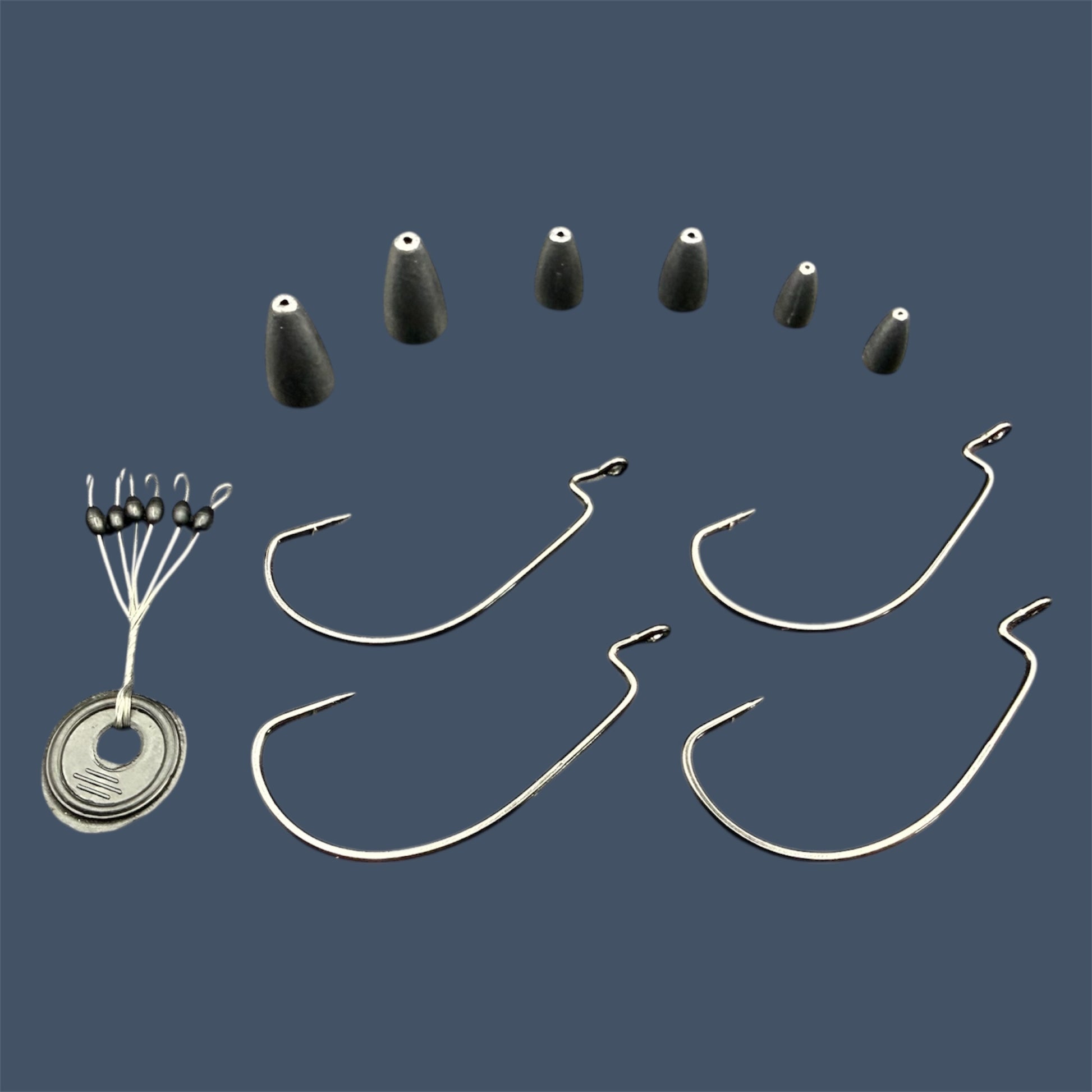 Close-up image of the Texas Rig Kit showing Eagle Claw®️ Size 3/0 & 4/0 EWG Hooks, Bullet Weights in various sizes and Weight Stops