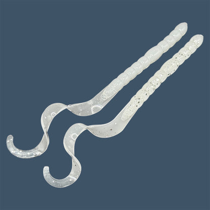 Soft plastic curly/ribbon tail worm 7.5-inch with realistic movement and versatile design for Texas and Carolina rigs. 7.5" Curl Tail Worm shown in White Ice