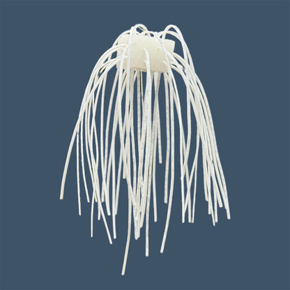 Skirted Cube Fuzzy Dice-style soft plastic bass lure, threaded with lifelike skirt material, perfect for drop shot and wacky rig finesse fishing.Shown in White Ice
