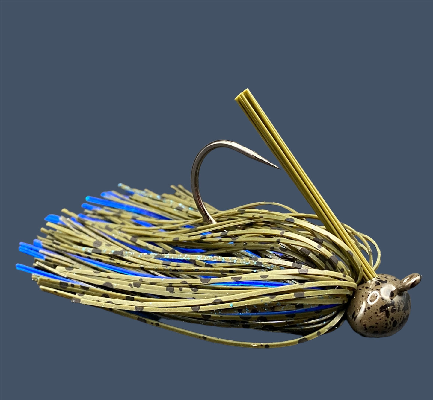 Football Jigs in Big "O" (Green Pumpkin and Blue) highlighting the robust Mustad Heavy Wire hooks, integrated plastics keepers, and flaring 100% silicone skirts.