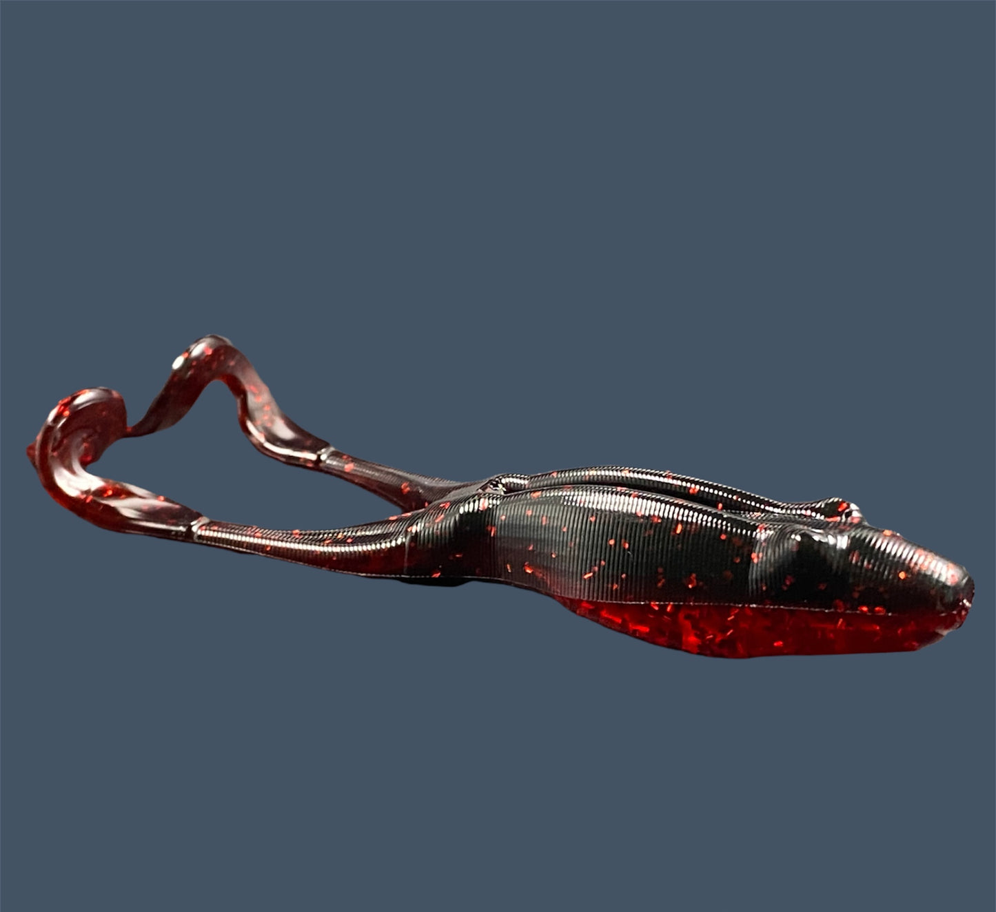 Tennessee Toad soft plastic frog bait with a weedless 4-inch robust body and long legs, designed for topwater and subsurface fishing, shown in Black Cherry (Black and Red) a proven fish-catching color