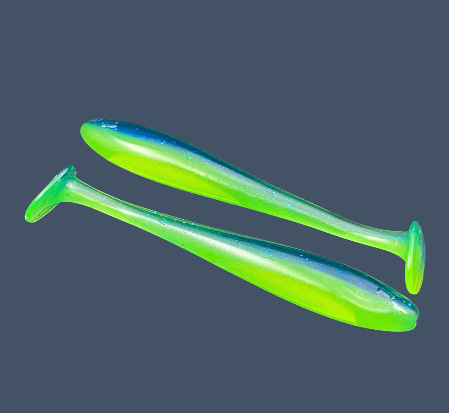 Pro Swim 4-inch paddle tail soft plastic swimbait with realistic shad shape and hook slot, shown in Electric Blue Chartreuse (Dark Blue with Chartreuse) a proven fish-catching color