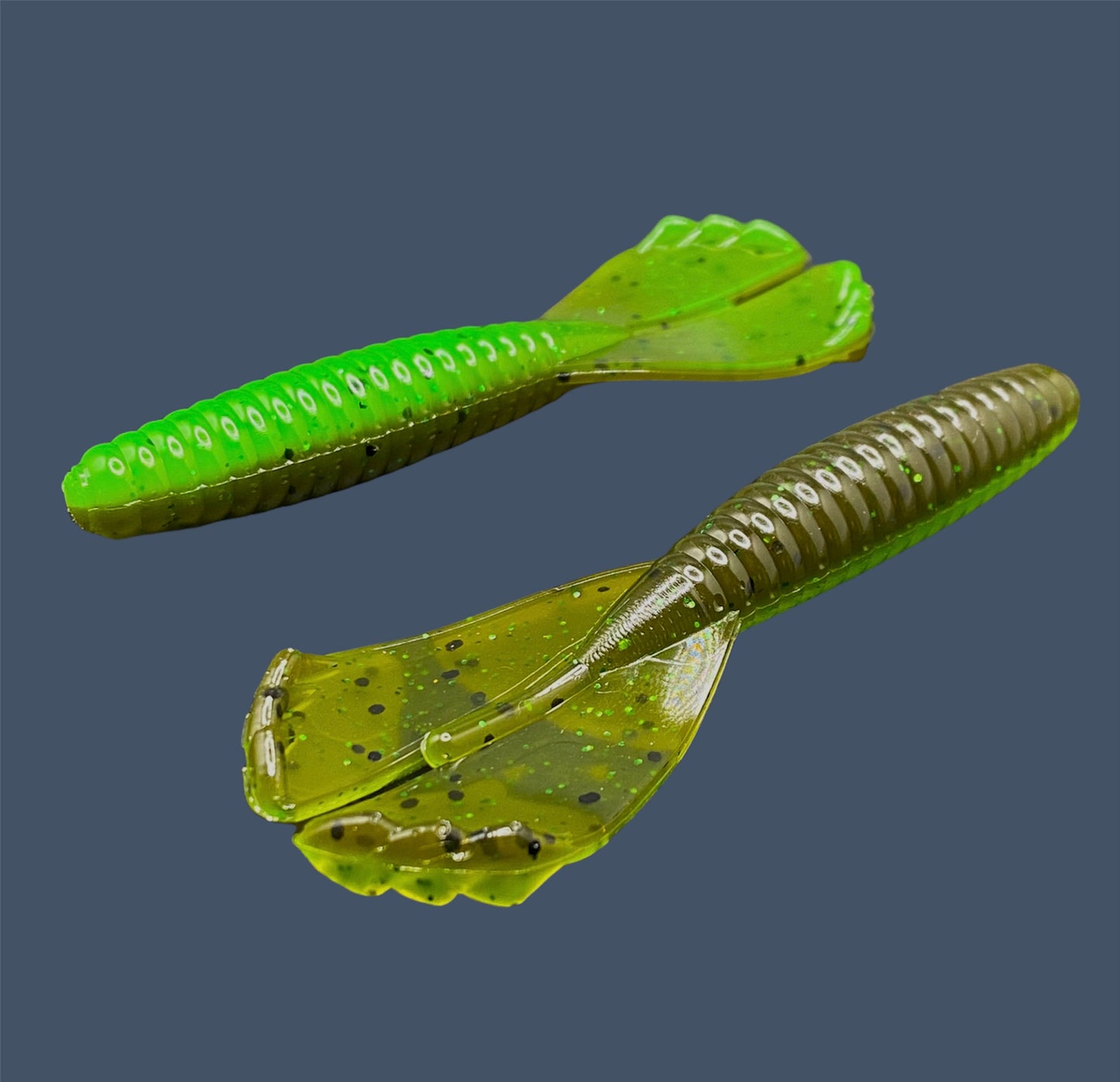 Soft plastic Grub 3.5-inch with twin-kicking tails, ideal for Texas rig, Carolina rig, and as a trailer, in Envy (Green Pumpkin)