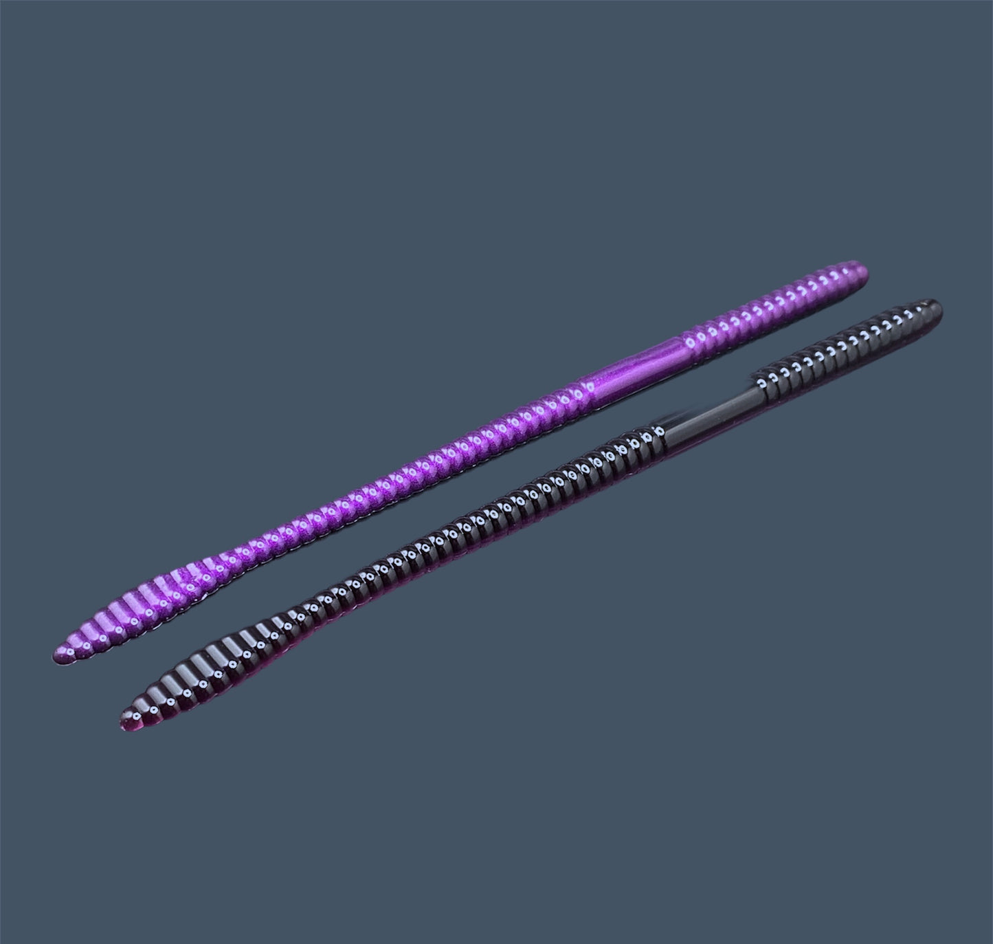 Soft Plastic Spade Tail Worm with flat spade-shaped tail and slender ribbed body, displayed in Midnight Purple (Black and Purple) a proven fish-catching color