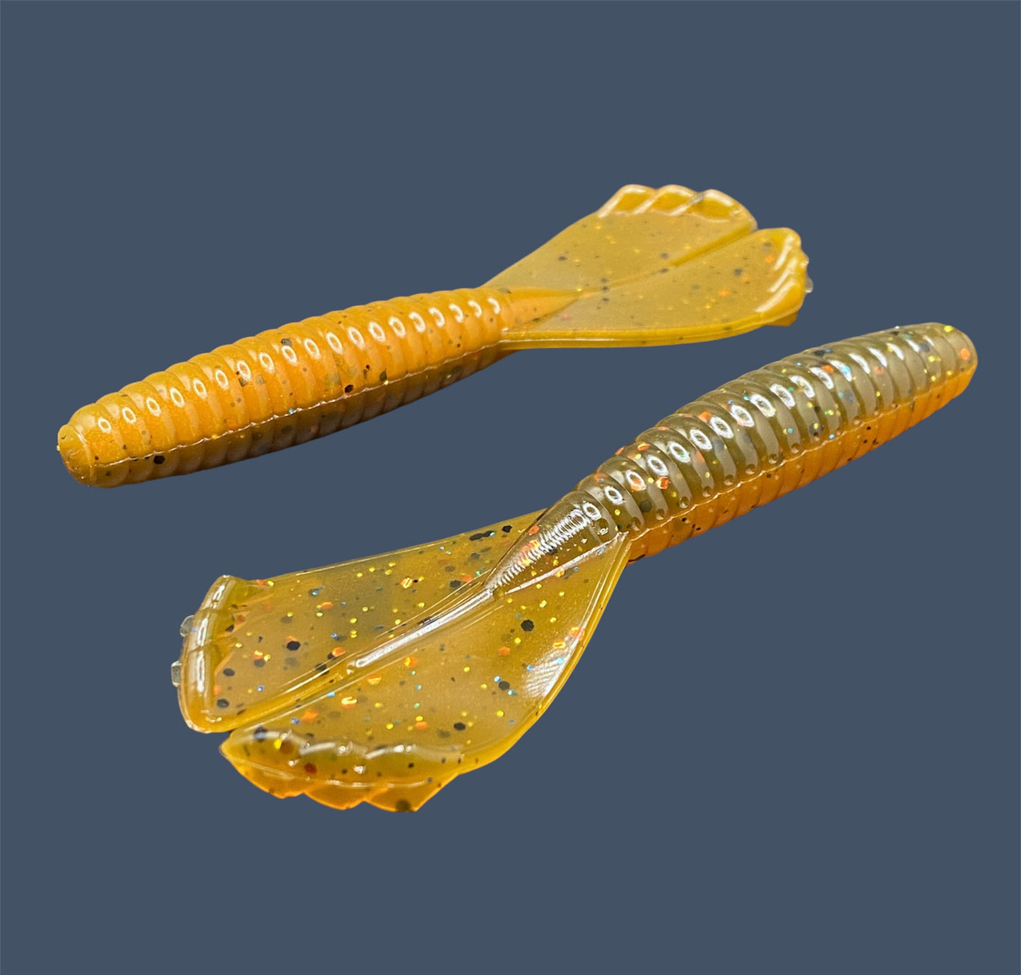 Soft plastic Grub 3.5-inch with twin-kicking tails, ideal for Texas rig, Carolina rig, and as a trailer, in Pumpkin Spice